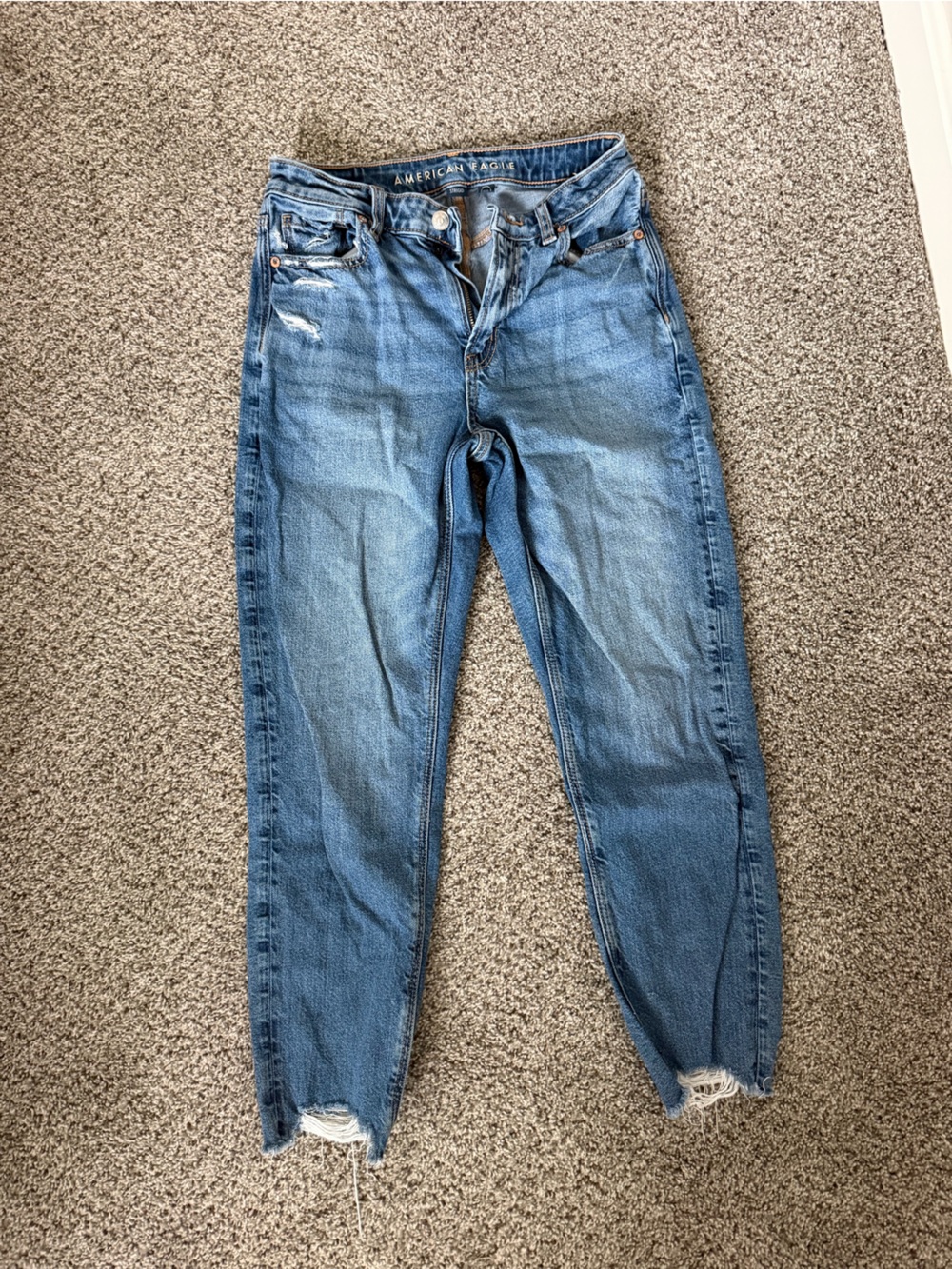 American Eagle Outfitters Light Blue Skinny Jeans with Distressed Hem